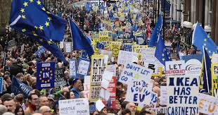 Countless people waving EU flags and anti-Brexit banners as they march in London